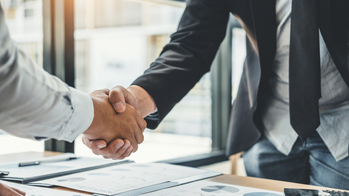 Business people colleagues shaking hands meting Planning Strateg