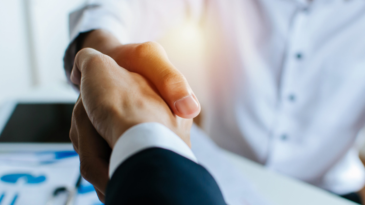 partnership-two-business-people-shaking-hand-after-business-job-interview-meeting-room-office